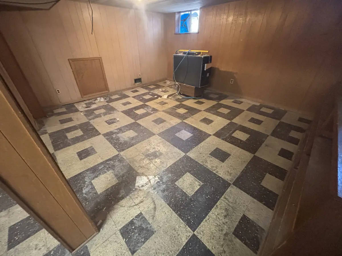 The same space cleared and broom-clean after the cleanout