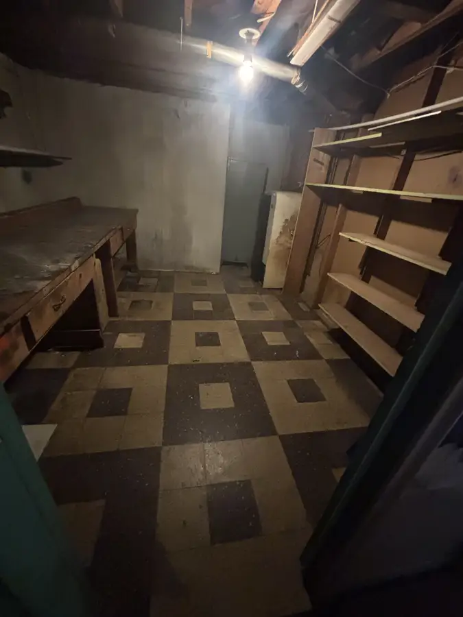 The same space cleared and broom-clean after the cleanout