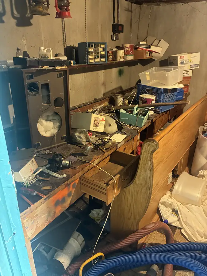 Cluttered space before cleanout by Michigan Cleanout C.R.E.W.