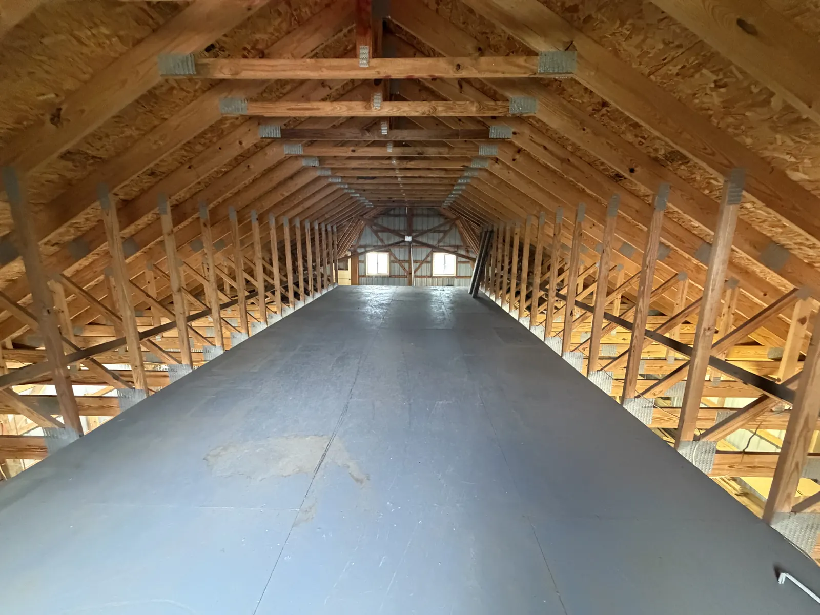 Large loft space completely cleared and swept after a full cleanout