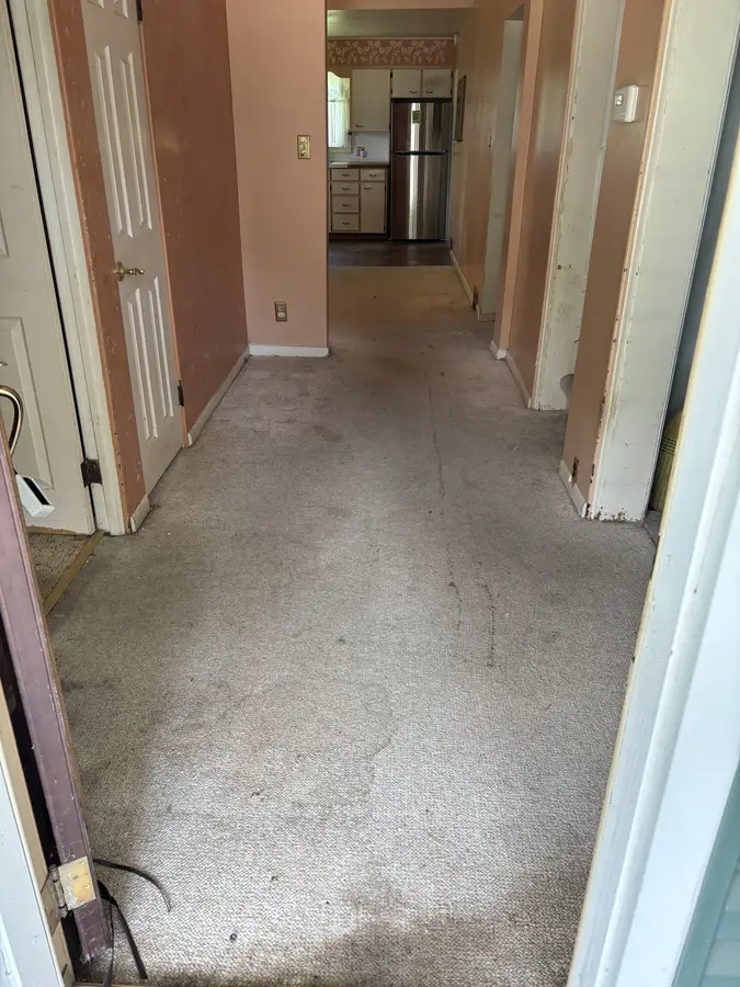 Hallway cleared and left broom-clean