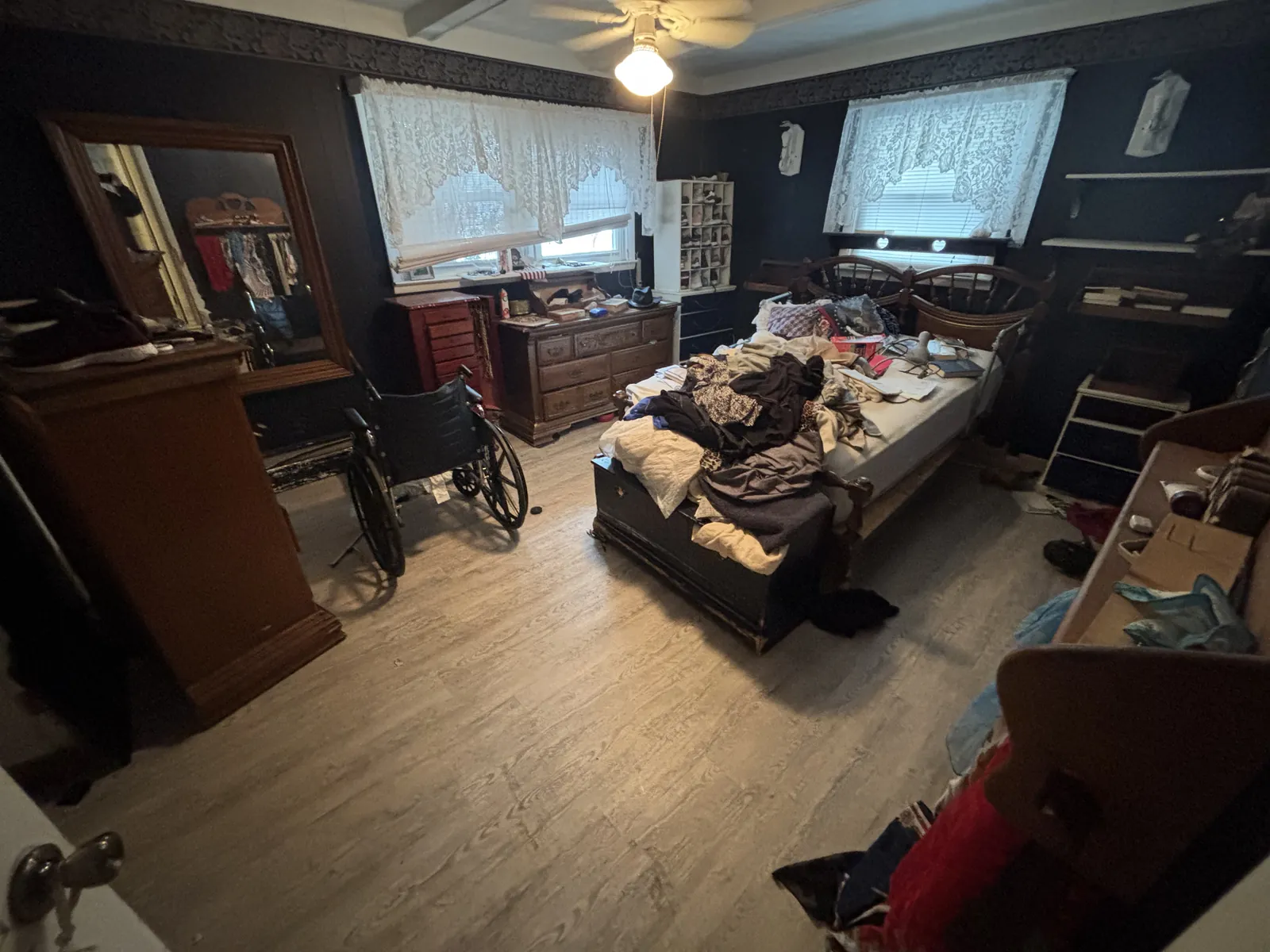 A packed bedroom before the estate cleanout