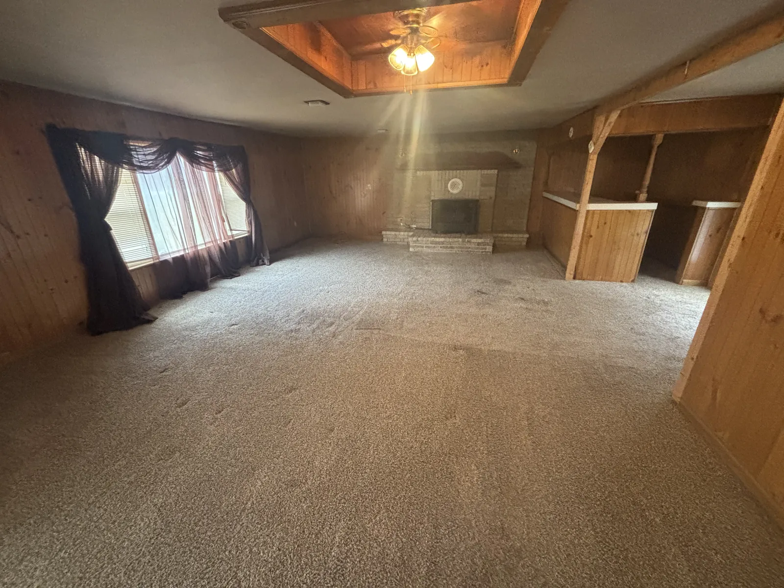 The same living room cleared and ready for photos