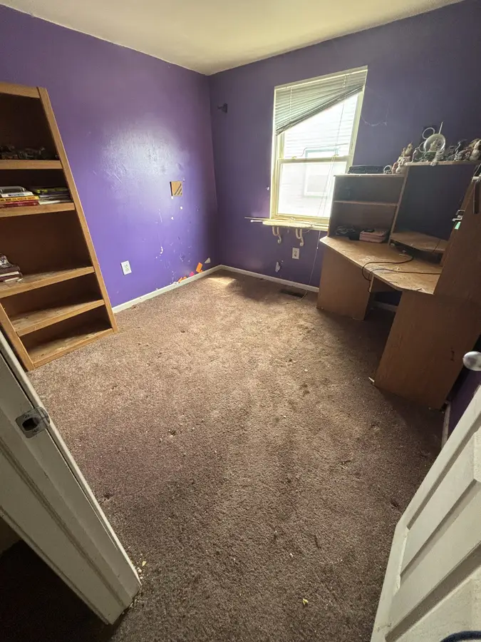 The same space cleared and broom-clean after the cleanout