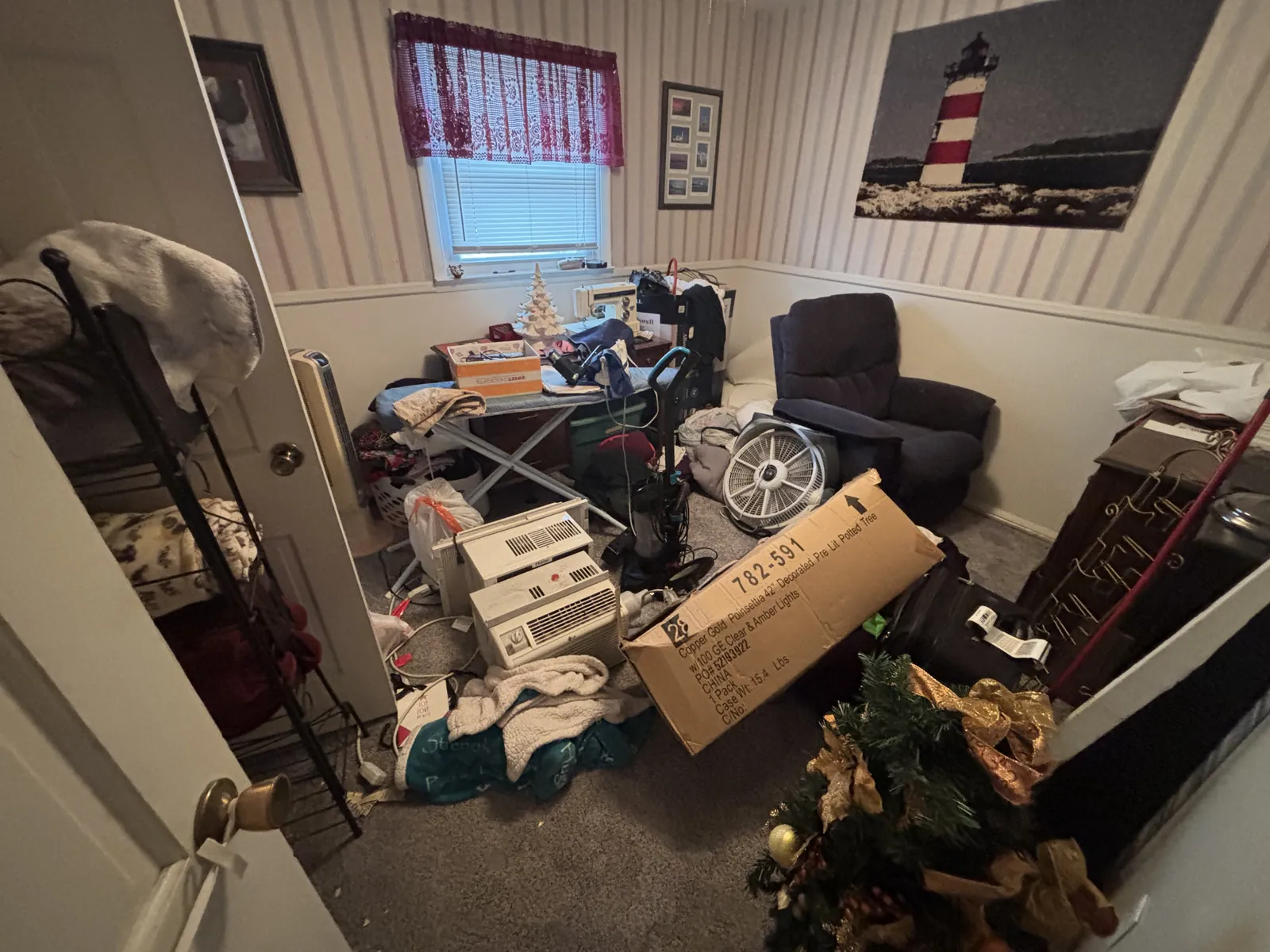 A spare room filled wall to wall before the cleanout